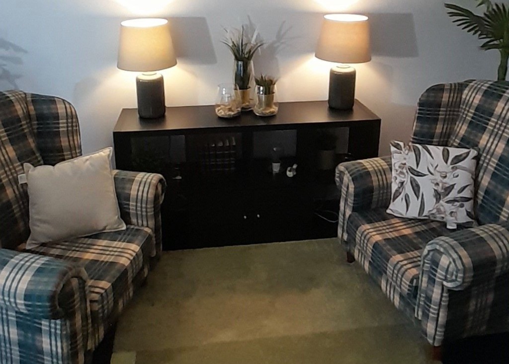 The Redesired counselling room with comfortable armchairs